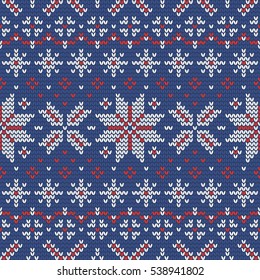 Christmas knitting seamless pattern with stars and snowflakes. Perfect for wallpaper, wrapping paper, pattern fills, winter greetings, web page background, Christmas and New Year greeting cards