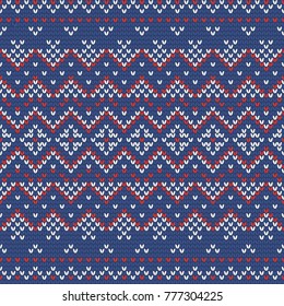Christmas knitting seamless pattern with triangles, stripes and rhombus. Perfect for wallpaper, wrapping paper, web page background, New Year greeting cards