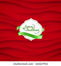 Christmas label over red wave background