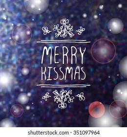 Christmas label with text on blurred  background. Merry kissmas. Typographic element with mistletoe. Handdrawn christmas badge.