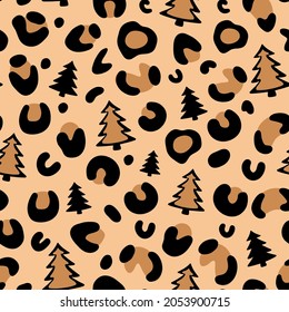 Christmas leopard print. Christmas tree Leopard Pattern. Camouflage leopard vector seamless pattern on beige background. Leopard skin texture. 