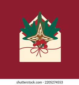 Christmas letter gift with gingerbread star, twigs and beak berries. Christmas design element.