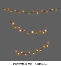 Christmas light bulbs isolated design elements. Glowing lights for Xmas Holiday greeting card design. Garland, Christmas decorations.