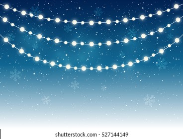 Christmas light bulbs on starry background