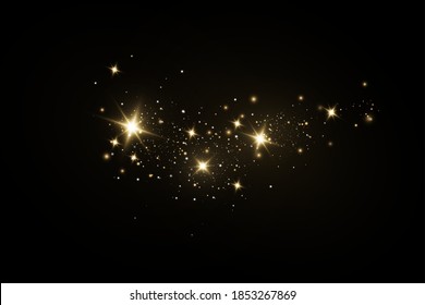 Christmas light effect. Sparkling magical dust particles.The dust sparks and golden stars shine with special light.