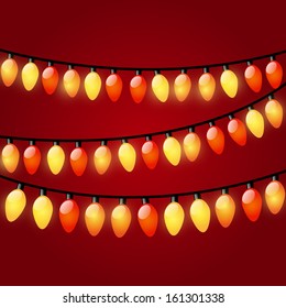 Christmas light garland on red