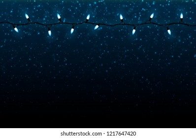 Christmas light on a snowy background