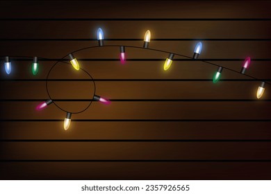 Christmas light on wooden background, holiday decorations with color