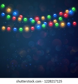 Christmas lights. Colorful bright Xmas garland on blue bokeh background.  Festive vector template