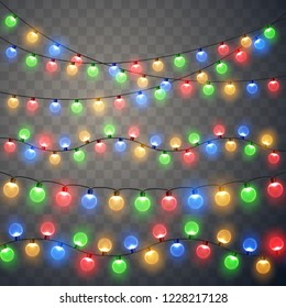 Christmas lights. Colorful bright Xmas garland. Vector light bulbs on wire strings isolated.