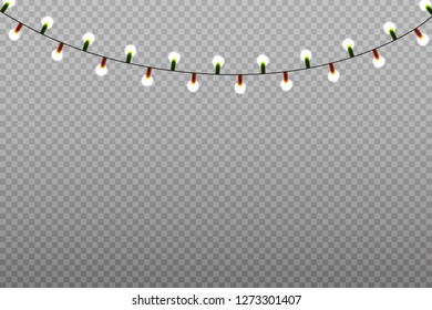 Christmas lights. Colorful Xmas garland. Vector red, yellow, blue and green glow light bulbs on wire strings isolated.