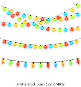 Christmas lights isolated on white background. Colorful bright Xmas garland. Vector red, yellow, blue and green glow light bulbs on wire strings. Festive vector template