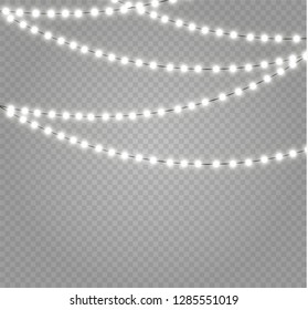 Christmas lights isolated realistic design elements. Glowing lights for Xmas Holiday cards, banners, posters, web design. Garlands decorations. Led neon lamp