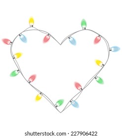 Christmas lights like heart isolated on white background