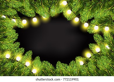 Christmas lights on pine branches. Garland lights decorations and spruce fir tree. Winter Holiday xmas mock-up and backdrop. Christmas tree branches frame