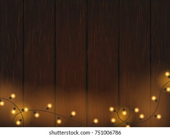 Christmas lights on wooden background . Glitter defocused golden vector illustration
