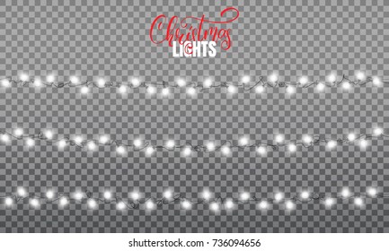 Christmas lights. Realistic string lights design elements of white color. Glowing lights for winter holidays. Shiny garlands for Xmas and New Year.