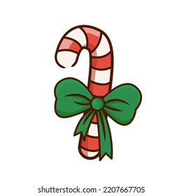 A Christmas lollipop with a green bow.