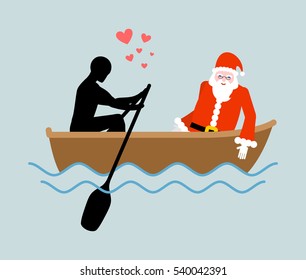 Christmas Lover. Man and Santa Claus and ride in boat. Lovers of sailing. Man rolls santa gondola. Rendezvous in boat on pond. Romantic New Year date.
