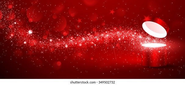 Christmas magic box with stream of stars on red background