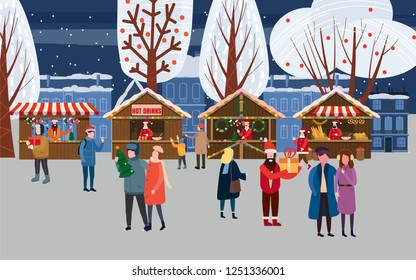 Christmas market or holiday outdoor fair on town square. People walking between decorated stalls, canopy or kiosks, buying snacks, gifts, decoration and drinking hot coffee, tea and mulled wine