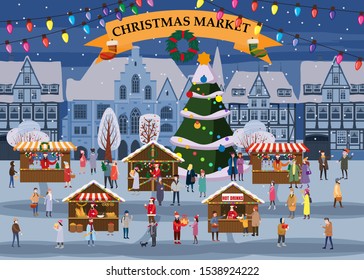 Christmas market or holiday winter outdoor fair on oldtown square big New Year tree cityscape. Big set of people walking, buying gifts, drinking coffee, decorated souvenir stalls or kiosks with gifts