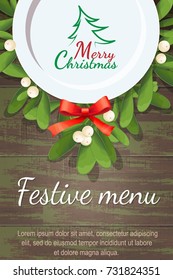 Christmas menu for restaurant or cafe. Blank plate is on a wooden table on the branches of mistletoe. Merry Christmas. tree.