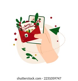 Christmas message banner. Vector illustration for New Year newsletter. Open  envelope with wishes, flowers, branches and lollipop coming of a phone screen in a hand. Template with text Merry Christmas