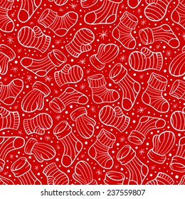 Christmas mittens and socks vector seamless pattern .