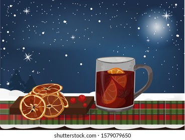 Christmas mulled wine with orange on the table with homes atmospher.