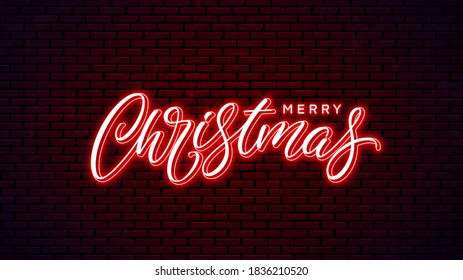 Christmas neon hand drawn lettering. Glowing holiday calligraphy isolated on wall background. Xmas neon text design. Merry Christmas handwritten lettering.
