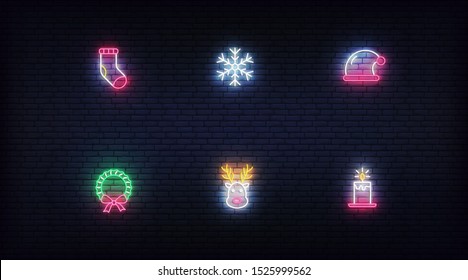 Christmas neon icons. Vector glowing neon colorful symbols for Xmas and New Year