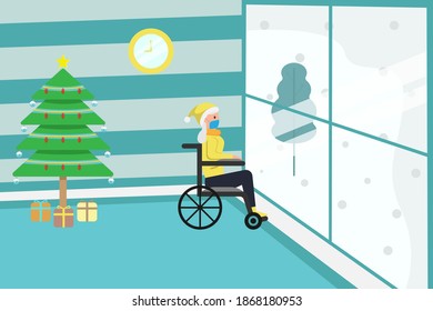 Christmas in new normal: Disabled woman wearing face mask and sitting on the wheelchair at home while looking at out of the window with christmas tree background
