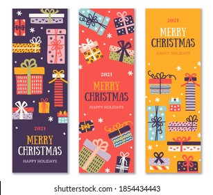 Christmas and New Year 2022 vertical banners set, border with colorful ornate gift boxes and snow confetti. Vector illustration. Place for text. Party brochure template