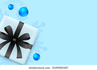 Christmas and new year background. Christmas ball and gift box on blue background. Winter holiday. Vector illustration