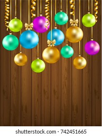 Christmas and New Year background with christmas balls and serpentine on wood background. Vector illustration.