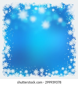 Christmas and New Year blurry blue vector background with stars and snowflakes