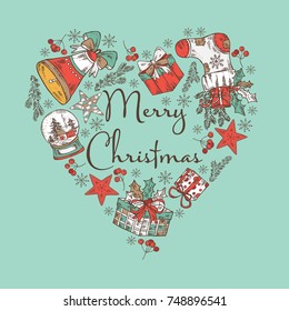 Christmas and New Year card in the shape of a heart with Christmas decorations and present. Vector hand drawn illustration.