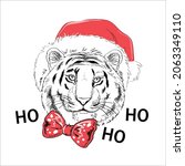 Christmas and new year card with a tiger wearing a santa claus hat. Hand drawn sketch illustration. Symbol of the Chinese New Year 2022