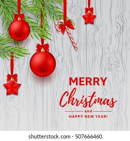 Christmas or New Year decoration banner. Vector illustration. Xmas composition with red balls and stars on fir-tree branch. Festive background with candy cane on wooden texture.