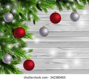 Christmas  New Year design light wooden background with christmas tree and silver and red balls