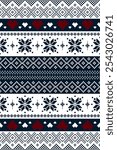 Christmas and New Year design. Red, blue and white seamless ethnic pattern. Christmas ethnic pixel pattern with Nordic flowers and hearts for winter hats, postcard, clothes, sweaters and jumpers.