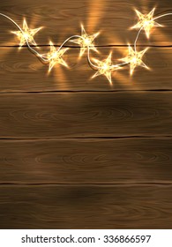 Christmas and New Year design template with wooden background and star-shaped lights. Vector illustration, eps10.