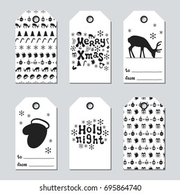 Christmas and New Year gift tags. Cards xmas set with hand drawing elements. Collection of holiday paper label in black and white. Seasonal badge sale design. Texture. Print. Vector illustration.