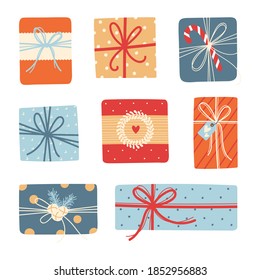 Christmas and New Year gifts on white background. Set of cute giftboxes. Vector illustration. Collection of xmas or birthday presents. Hand drawn design elements. Happy holidays!