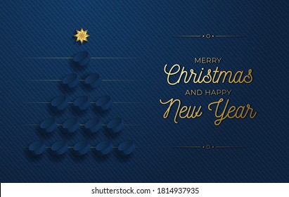 Christmas and new year greeting card. Creative Xmas tree made by hockey puck on blue background for Christmas and New Year celebration. Sport greeting card