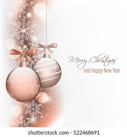 Christmas and New Year greeting card. Hanging baubles with bow, glitter snowflake and blurred circles.