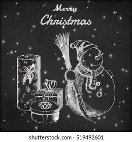 Christmas or New year hand drawn vector illustration. Snowman in winter hat with broom and gift sketch, vintage style. Grunge blackboard background.