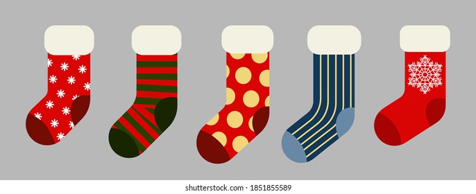 Christmas and New year holiday traditional colorful socks with holiday patterns. Deer and Santas helpers elves on present warm winter stockings and candy strips flat vector isolated icon set.