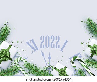 Christmas and New Year horizontal background. Green fir, candy cane, gift box. Clock showing 2022. Vector illustration.